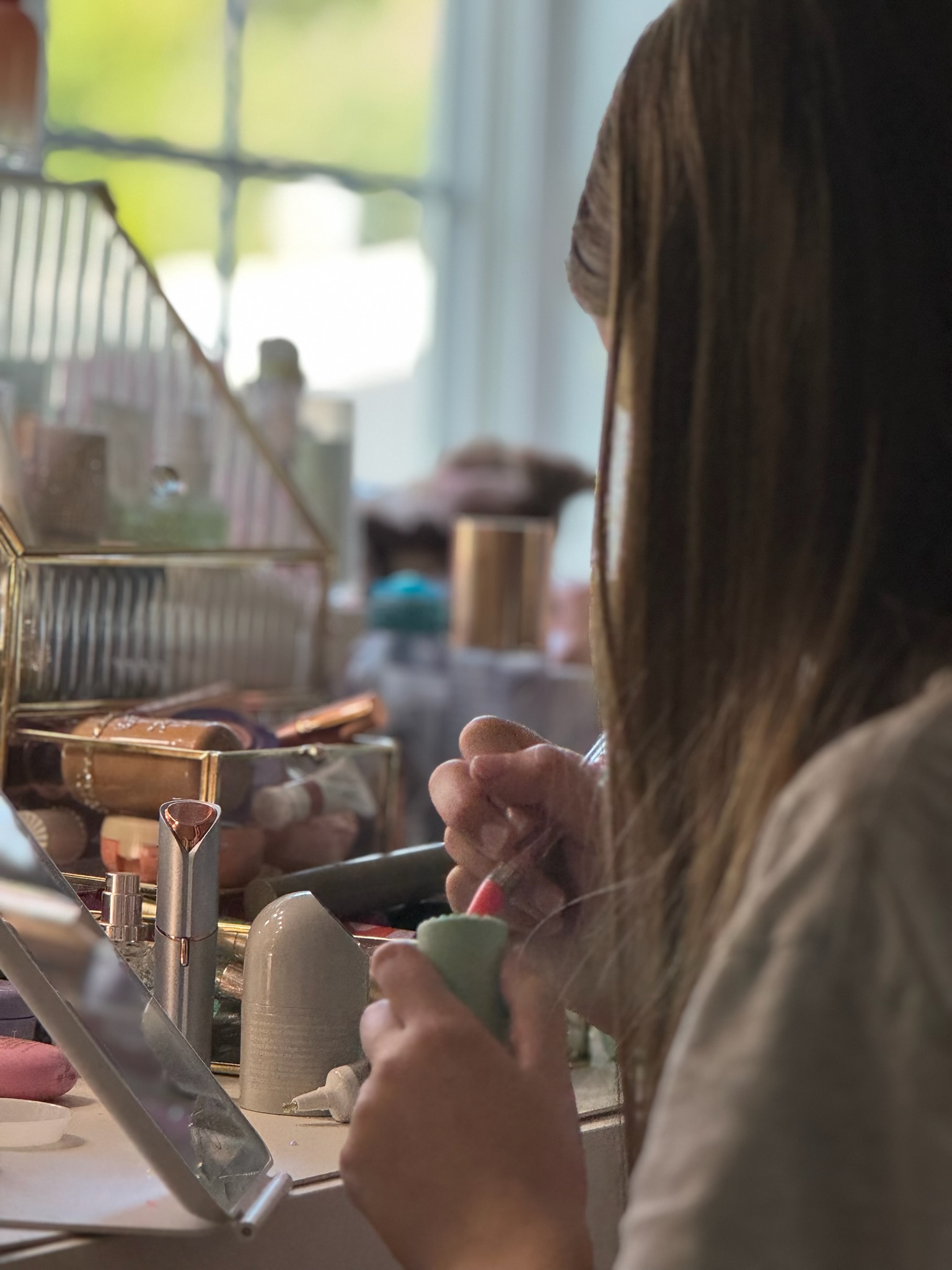 Stel working on a bedazzled creation
