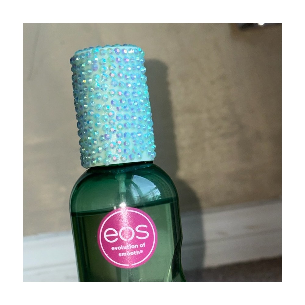 Close-up of bedazzled EOS bottle by Stel
